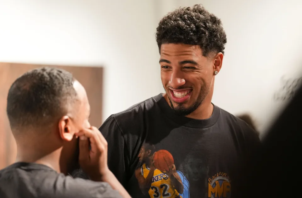 Tyrese Haliburton smiling while visiting BUTTER Fine Art Fair in Indianapolis