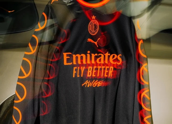 AC Milan and A$AP Rocky black long-sleeve jersey hanging inside a car with red sleeve graphics