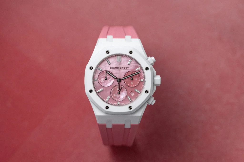 Front view of Serena Williams’ white ceramic Royal Oak chronograph against a pink background