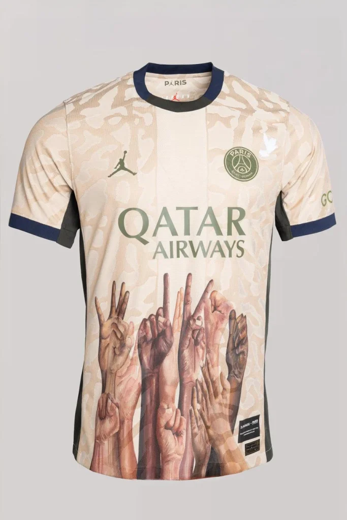 Model wearing the beige PSG twelfth-title jersey with raised hands and a white dove.